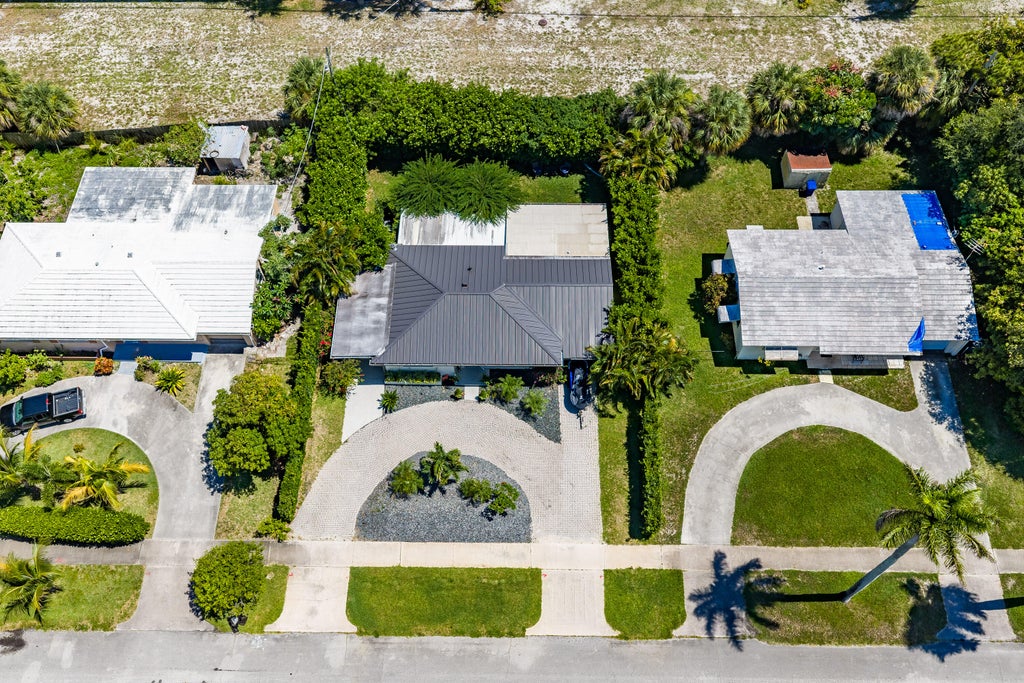 Photo of 722 Greenbriar Drive, Lake Park, FL 33403 (MLS # B26043382)