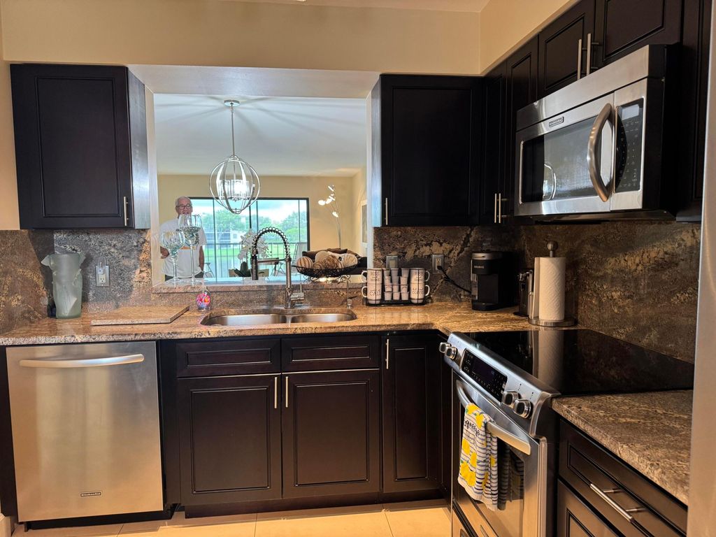 Photo of 6149 Pointe Regal 301 Circle #301, Delray Beach, FL 33484 (MLS # R11027865)