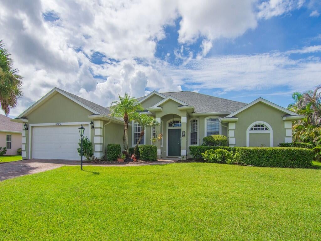 Photo of 5625 Riverboat Circle SW, Vero Beach, FL 32968 (MLS # B26072587)