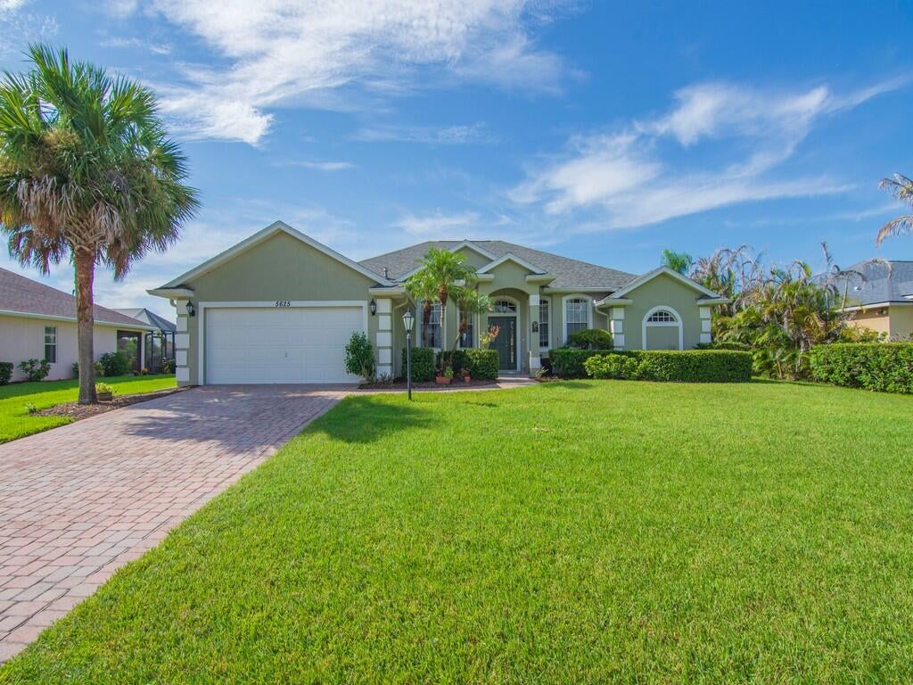 Photo of 5625 Riverboat Circle SW, Vero Beach, FL 32968 (MLS # B26072587)