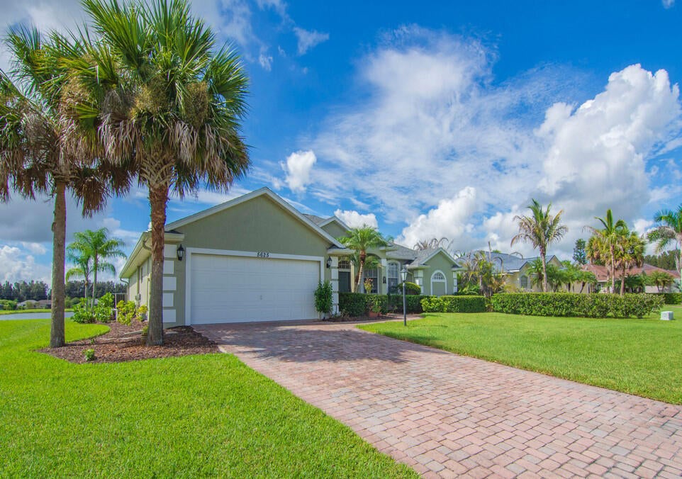 Photo of 5625 Riverboat Circle SW, Vero Beach, FL 32968 (MLS # B26072587)