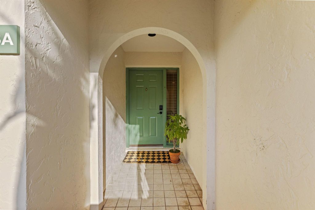 Photo of 23 Lexington Lane W #A, Palm Beach Gardens, FL 33418 (MLS # R11094878)