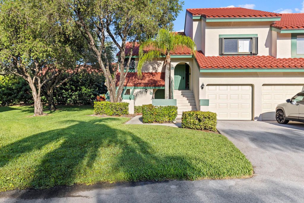 Photo of 23 Lexington Lane W #A, Palm Beach Gardens, FL 33418 (MLS # R11094878)