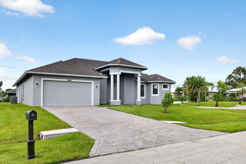Photo of 4689 SW Tacoma Street, Port Saint Lucie, FL 34953 (MLS # B26094977)