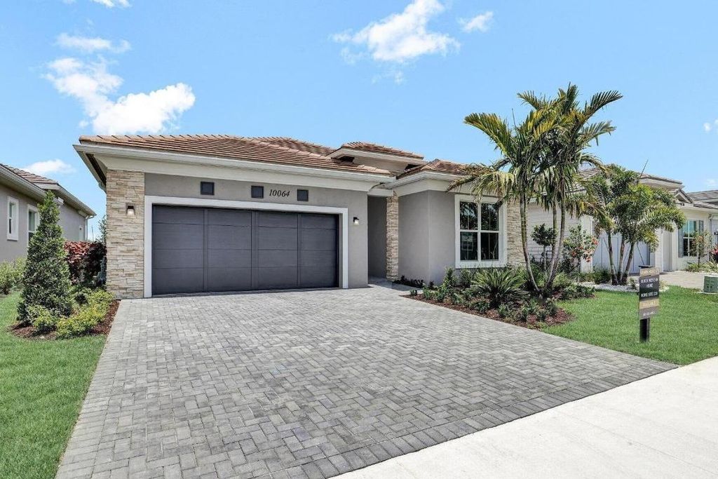 Photo of 10064 Driftwood Way, Palm Beach Gardens, FL 33412 (MLS # R11134247)