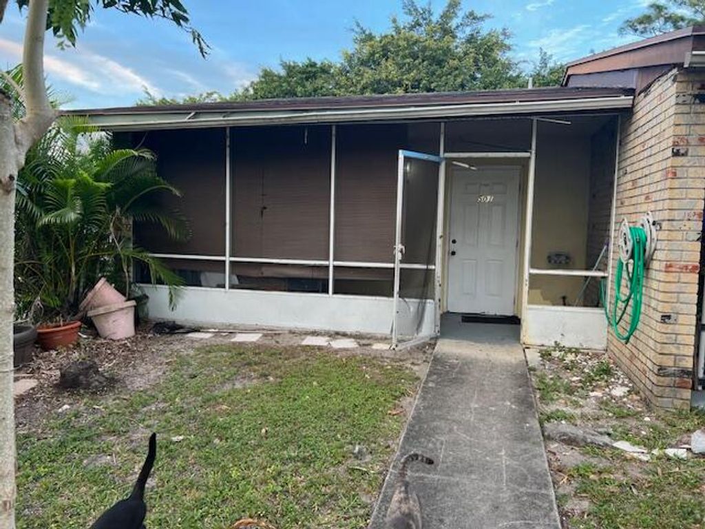 Photo of 4919 Freedom Circle, Lake Worth, FL 33461 (MLS # B26051708)