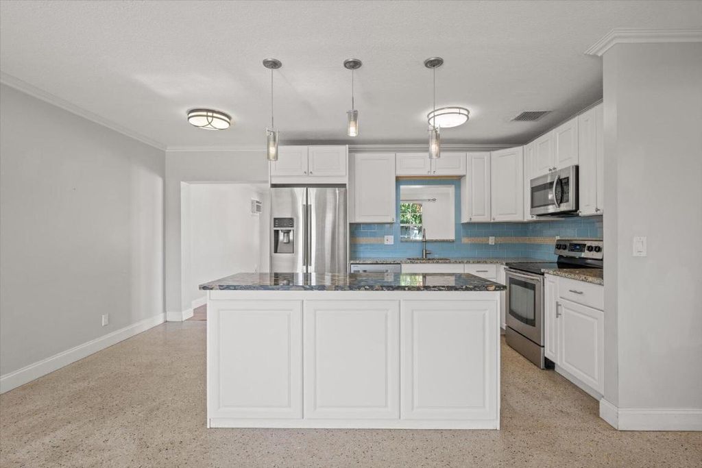 Photo of 3737 Gull Road, Palm Beach Gardens, FL 33410 (MLS # R10941346)