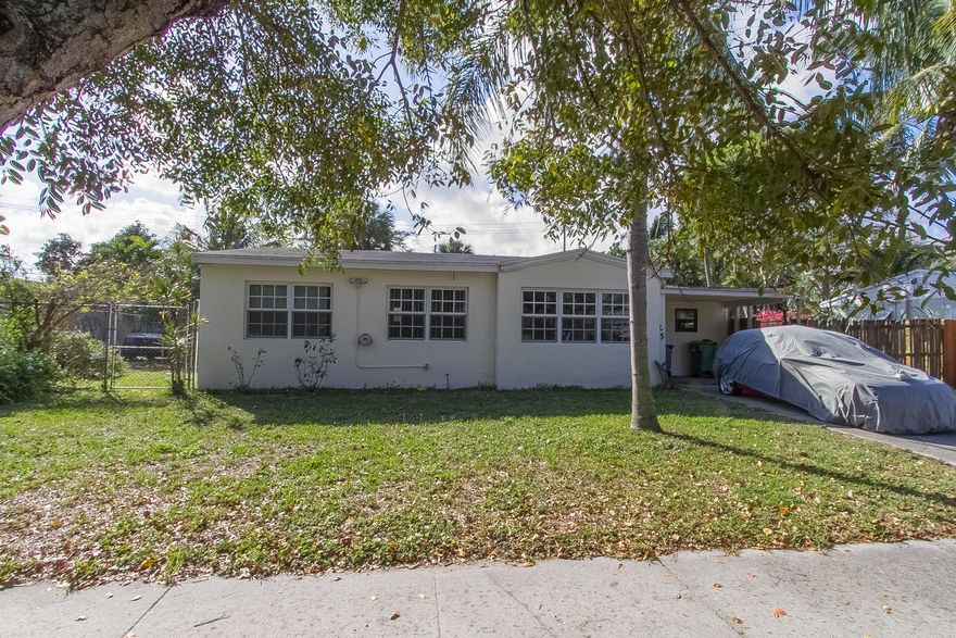 Home is SOLD AS IS. CASH ONLY.  Buyer must do own due diligence during inspection period. Handyman needing LTC.   Most are impact windows.  A/C 2008.   Nice floor plan.  Super large lot.  Home has a great location near I-95.
There is also an additional room probably best for storage that is 10 x 14 with an exterior entry and an additional storage area that is 4-10.