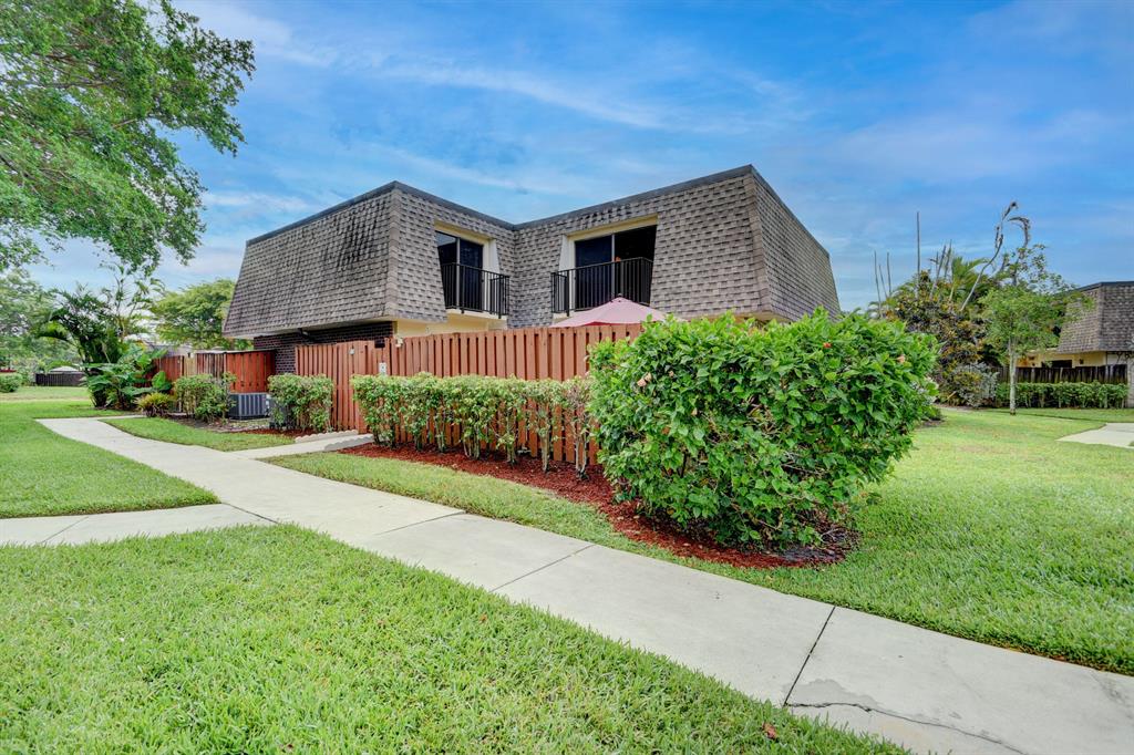 Location, Outdoor Space, Minutes to everything? Come live in a pet-friendly, quiet, & sought-after community of 12 acres nestled by a park-like setting! Your spacious home has a beautiful kitchen with stainless steel appliances and granite countertops. A new washer, a 3-year-old A/C and a 2-year-old water heater. A master bedroom balcony with a view of the lake. Delight in the outdoors by creating your personal oasis to socialize and relax in your private courtyard. In this community of all ages, you will enjoy the salt-water, heated swimming pool adjacent the clubhouse, tennis court, pickle court and two picnic areas facing the lake. Minutes from the beaches, shopping, a vibrant downtown, I95, hospitals. Bring your best offer. Open House May 22nd from Noon to 3pm.