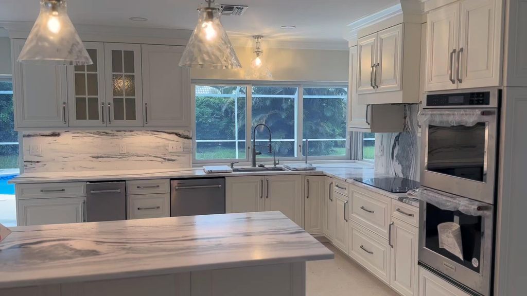 Photo of 984 SW Pepperridge Terrace, Boca Raton, FL 33486 (MLS # R11003440)