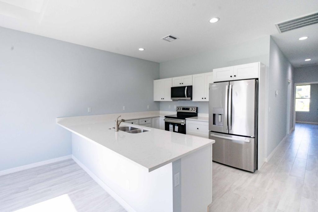 Photo of 1125 11 Court SW, Vero Beach, FL 32962 (MLS # R11102724)