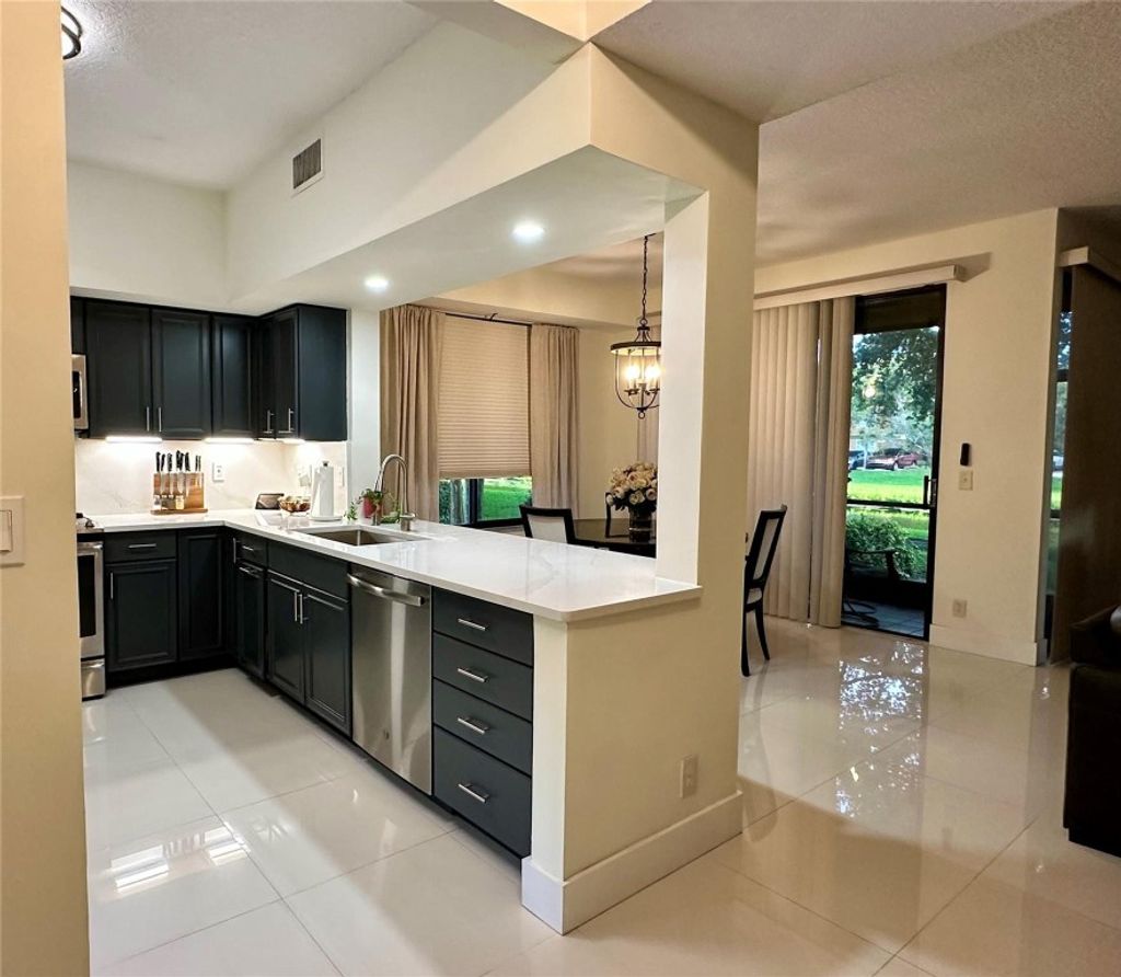 Photo of 10508 NW 10th Street #A-123, Fort Lauderdale, FL 33322 (MLS # F10460376)