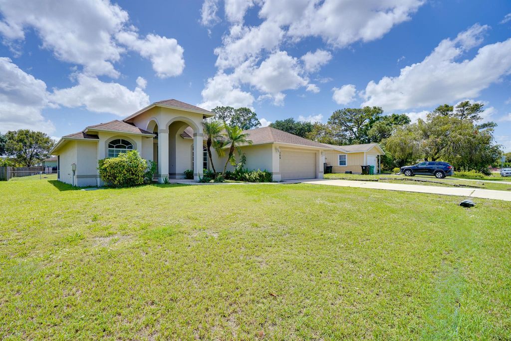 Photo of 766 SW Duxbury Avenue, Port Saint Lucie, FL 34983 (MLS # R11098814)