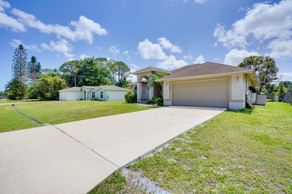 Photo of 766 SW Duxbury Avenue, Port Saint Lucie, FL 34983 (MLS # R11098814)