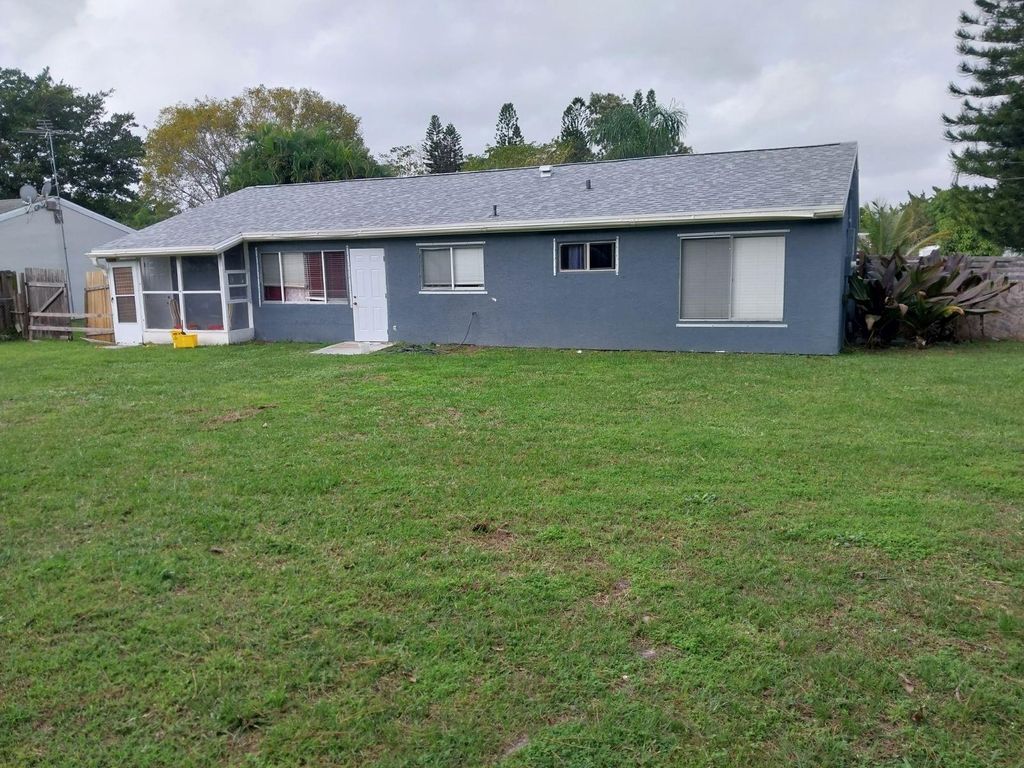 Photo of 2029 SE Hideaway Circle, Port Saint Lucie, FL 34952 (MLS # F10456979)