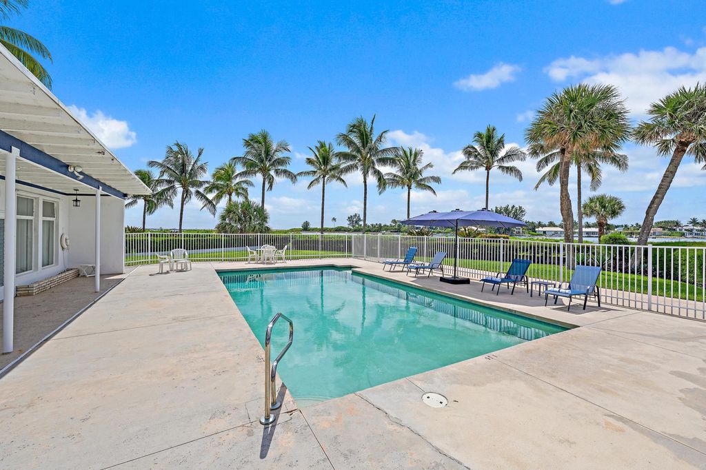 Photo of 320 Inlet Way #6, Palm Beach Shores, FL 33404 (MLS # R11029001)