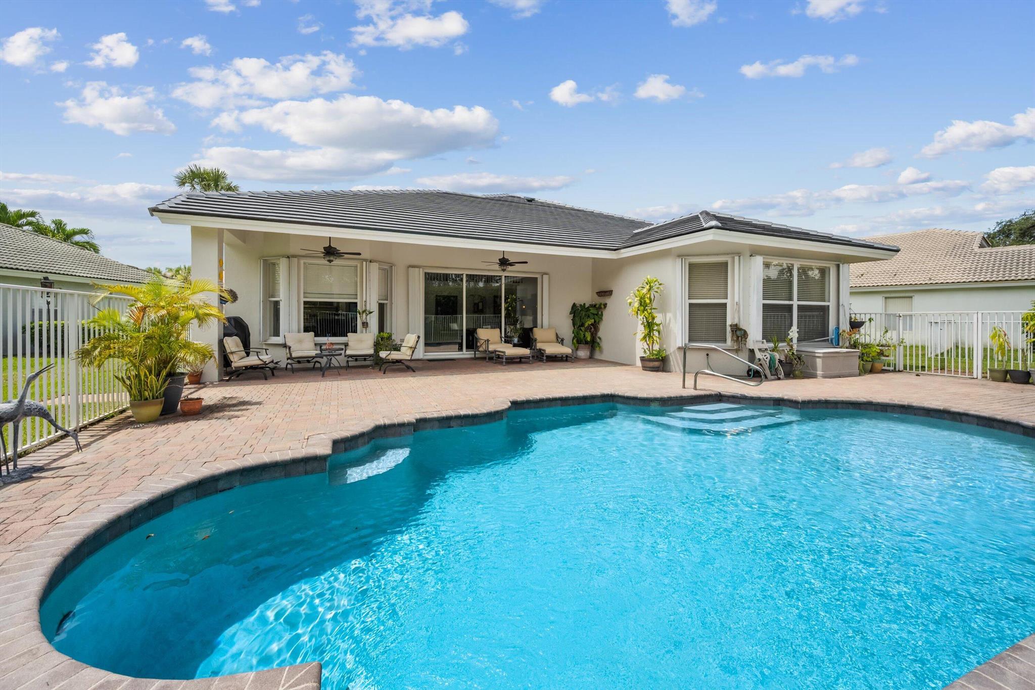 Wellington is a world-renowned destination, especially during its high season, which runs from roughly November through April. This is when the city truly comes alive, hosting the annual Winter Equestrian Festival, a globally respected event that draws thousands of visitors and participants. The demand for quality rentals skyrockets during this period, making properties like this 5-bedroom pool home highly sought after. Step inside to discover a spacious and thoughtfully designed home perfect for both relaxing and entertaining. A large family room and a laundry/utility room add to the home's functional appeal.The convenience and luxury of this property, combined with the unparalleled lifestyle of The Isles at Wellington, make it the perfect choice for families and professionals!
