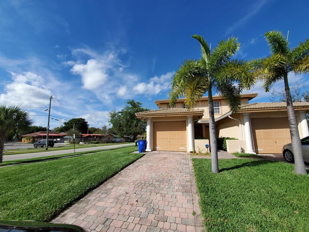 Photo of 197 NW Eller Street, Deerfield Beach, FL 33441 (MLS # R10705211)