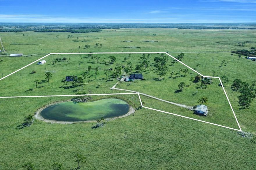 Expansive 40+ acre property in Okeechobee with multiple existing buildings and major capital improvements completed within the last year. The property includes two residences (each 5BR/3BA), a large dining/meeting hall, RV pads, swimming pool, and a large barn. The rolling acreage provides privacy, open space, and flexibility for future use.Currently operating as a church retreat/camp with infrastructure in place for group use and events. Strong potential for a private compound, retreat-style project, agricultural lifestyle, or long-term investment. Buyer to verify all intended uses.