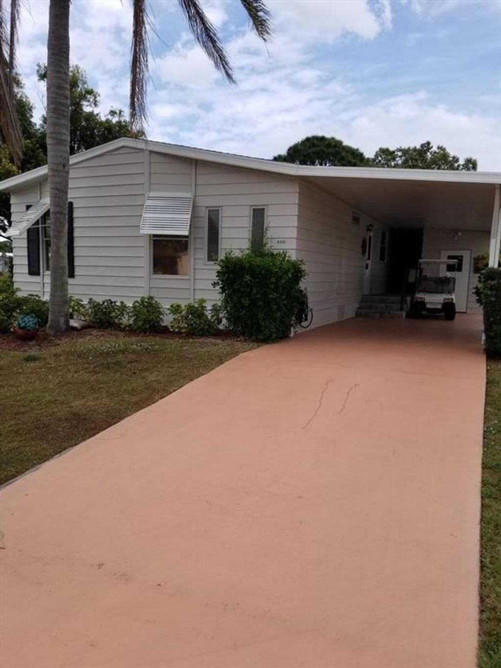 Photo of 8200 Bitterbush Lane, Port Saint Lucie, FL 34952 (MLS # R10698096)