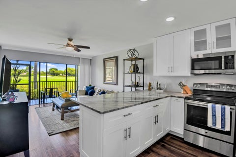 Photo of 401 Greensward Lane #102-a, Delray Beach, FL 33445 (MLS # B26033168)