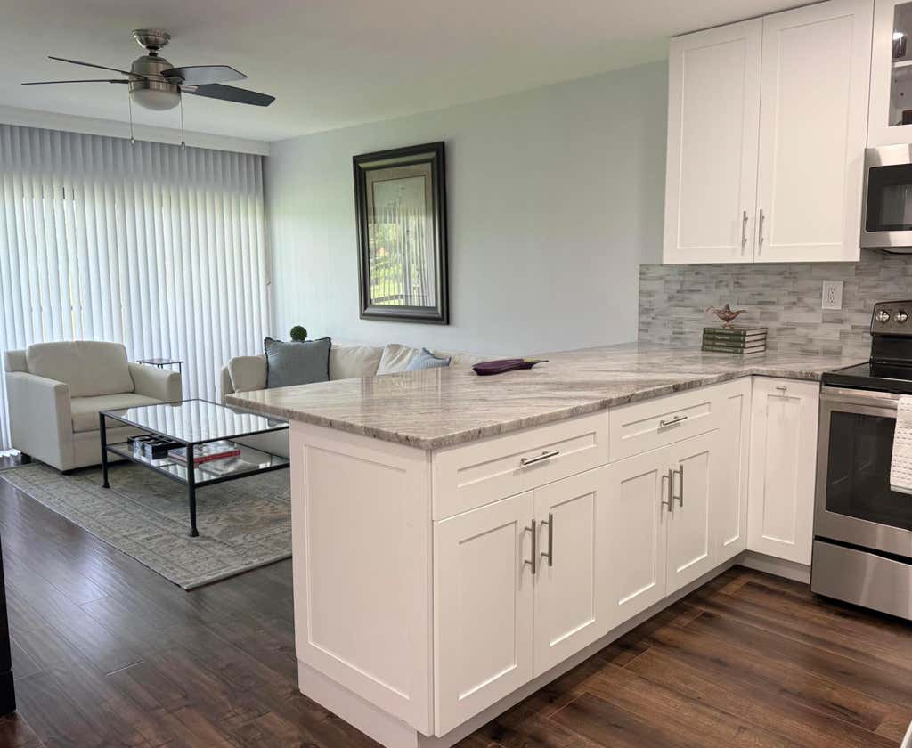Photo of 401 Greensward Lane #102-a, Delray Beach, FL 33445 (MLS # B26033168)