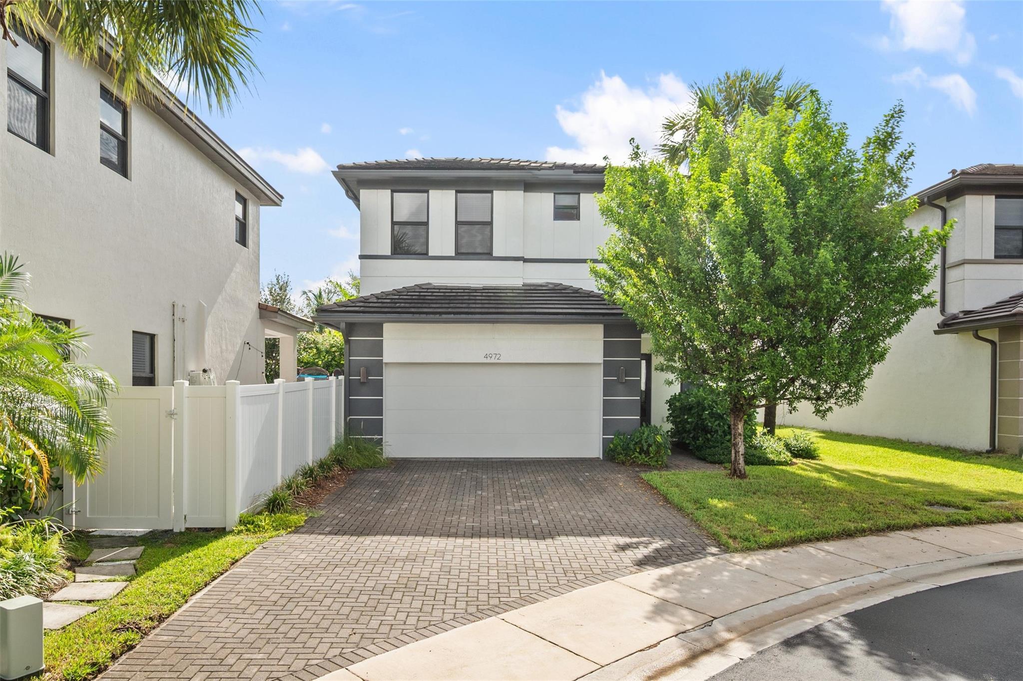 Beautifully maintained 3 bedroom, 3 bath plus den home built in 2019 in the desirable gated community of Whispering Oaks. The open layout includes a modern kitchen with large island, gas appliances, and walk-in pantry. The first floor offers a spacious dining area, living room, and a den/office that can serve as a 4th bedroom. Upstairs, the primary suite features two walk-in closets and a bath with dual vanities, soaking tub, and separate shower. Additional features include a 2-car garage with EV charger hookup and a covered backyard patio perfect for relaxing or entertaining.