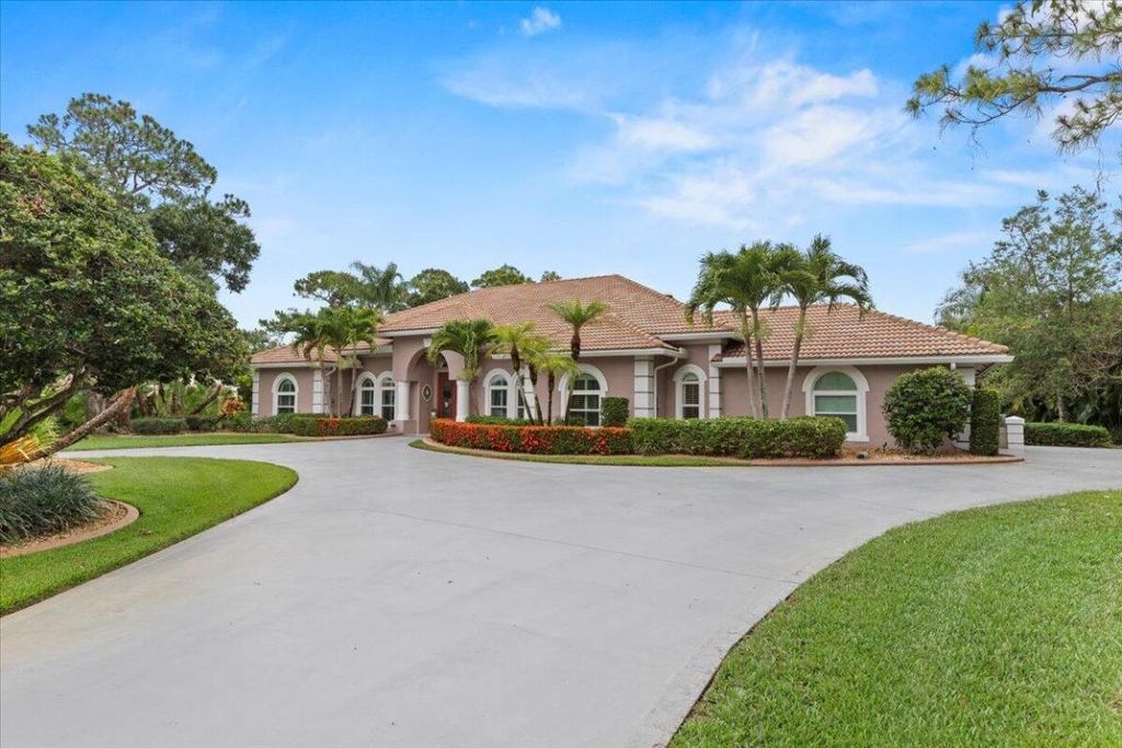 Photo of 11124 Lands End Chase, Port Saint Lucie, FL 34986 (MLS # R10997078)