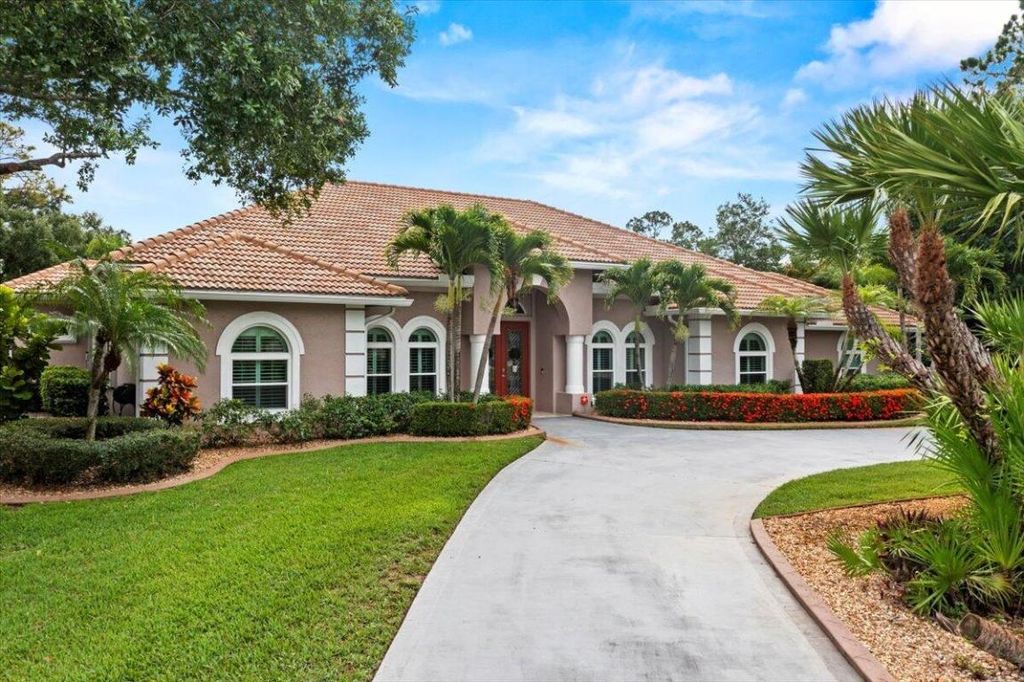 Photo of 11124 Lands End Chase, Port Saint Lucie, FL 34986 (MLS # R10997078)