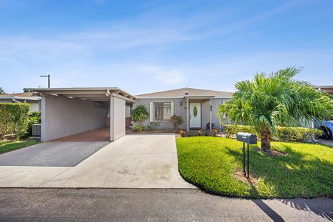Photo of 14842 Wildflower Lane, Delray Beach, FL 33446 (MLS # R11134585)