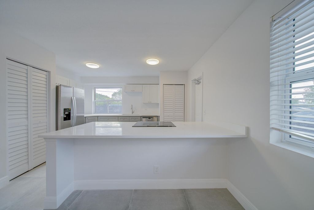 Photo of 1613 NE 3rd Avenue #3, Delray Beach, FL 33444 (MLS # R11003401)