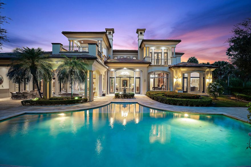 Magnificent custom home nestled on a secluded acre in the desirable Custom Estate section of Old Palm Golf Club. Overlooking the beautiful Raymond Floyd designed golf course 16th hole. Expertly designed & built by Courchene Development. Jerusalem stone and onyx marble flooring throughout. Grand vaulted ceilings with beams, 2 exquisite turrets bringing in natural light. Wet Bar w/walk-in refrigerated wine room. Grand dining room w/cove lighting, niches, wall moldings & adjacent butlers pantry. Very spacious master bedroom w/his/hers elegant bathrooms, European tub, bidet & dressing rooms. 4 car garage epoxy flooring, lift for 5th car. Outdoor covered lanai w/tongue and groove ceiling & summer kitchen. Natural gas LR fireplace, heated pool & spa. Mature lush landscape, whole house generator. Just steps away from one of the most exclusive clubs in the country, Old Palm Golf Club. There are no tee times to play on this pristine signature Raymond Floyd designed course. A separate 3 hole practice studio with Trackman V-1 swing analysis makes Old Palm Golf Club the perfect golf haven for the avid golfer or beginner. Club house features fine dining, lounge, men's and women's spa, fitness center, pool with cabanas, one bedroom casitas for rent. Membership includes beach membership at the Palm Beach Hilton on Singer Island, mins to the beach and popular restaurants along the PGA corridor, Palm Beach and Jupiter.