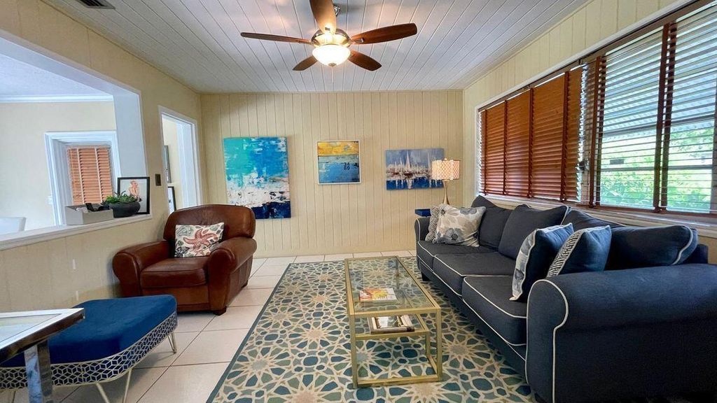 Photo of 235 Fordham Drive, Lake Worth Beach, FL 33460 (MLS # B26012108)