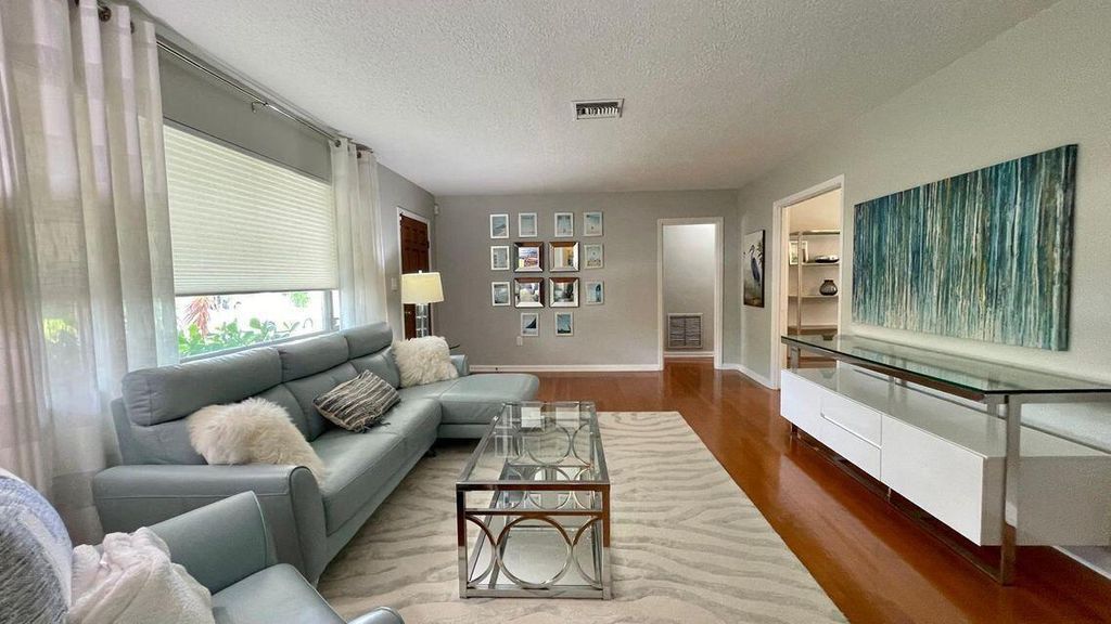 Photo of 235 Fordham Drive, Lake Worth Beach, FL 33460 (MLS # B26012108)