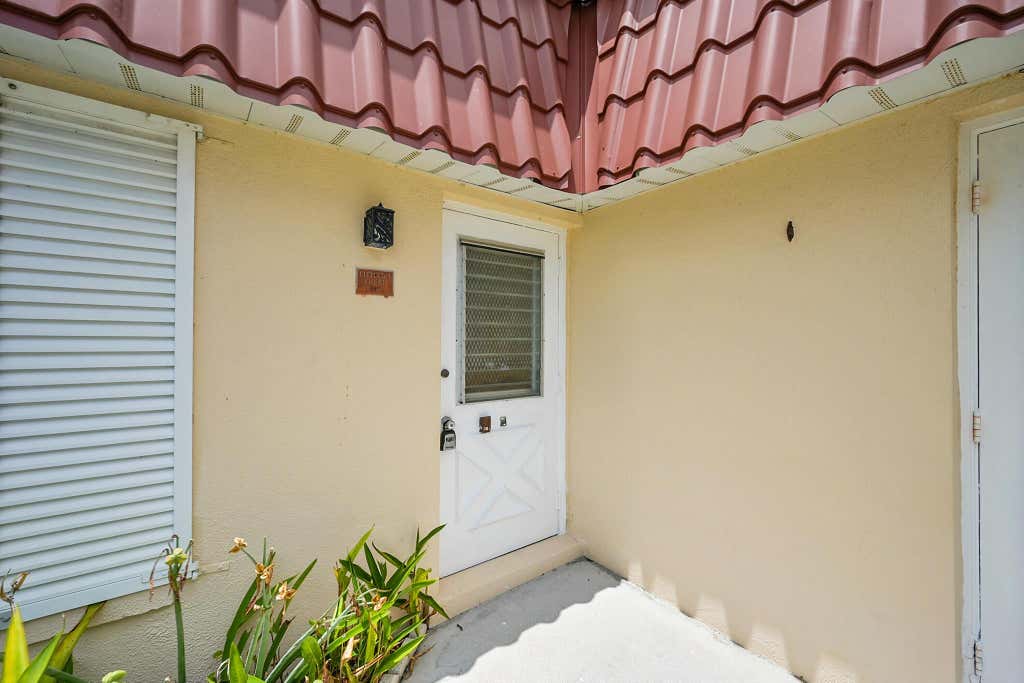 Photo of 613 Laconia Circle, Lake Worth, FL 33467 (MLS # R11088043)
