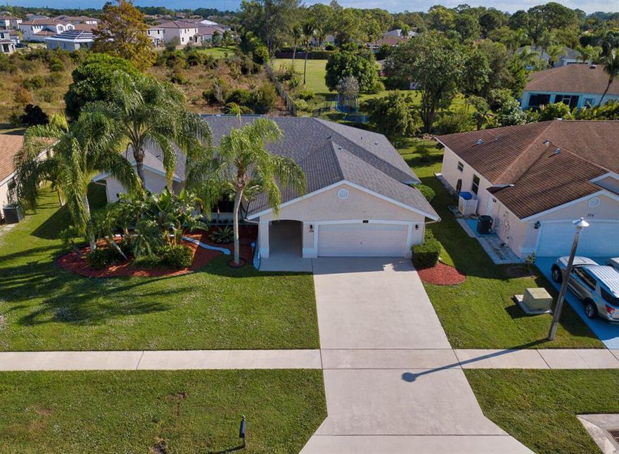 Enter this quiet neighborhood and you'll feel quickly at home. This beautiful Pool home sits on an oversized lot and has new deluxe vinyl wood plank floors, a newer roof, newer A/C, newly refinished pool and enclosure and a great yard. This light and bright home Needs only your personal touches to feel ''Home at Last''