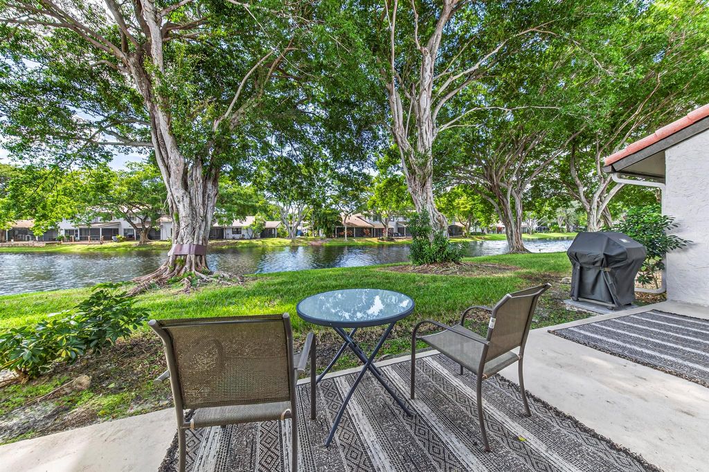 Photo of 660 Deer Creek Edgewater Drive, Deerfield Beach, FL 33442 (MLS # R11134620)