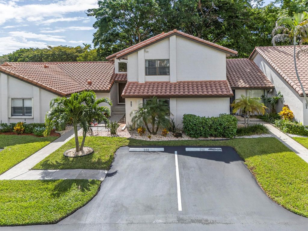 Photo of 660 Deer Creek Edgewater Drive, Deerfield Beach, FL 33442 (MLS # R11134620)
