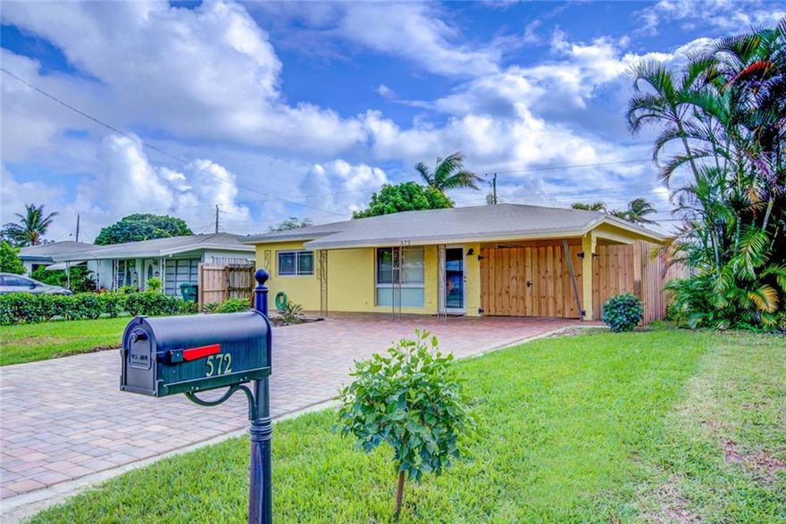 IMMACULATE UPDATED 2 BEDROOM 2 BATH NORTH ANDREWS GARDEN HOME.  OPEN FLOOR PLAN!  LARGE UPDATED KITCHEN WITH STAINLESS STEEL APPLIANCES AND GRANITE COUNTERS!  SEPARATE FAMILY ROOM!  TILE AND TERRAZZO FLOORING THROUGHOUT!  INDOOR LAUNDRY ROOM!  NEW ROOF (MARCH 2017)!  NEW A/C (JAN 2017)!  UPDATED 200amp ELECTRIC PANEL!  ALL IMPACT WINDOWS AND DOORS!  ATTACHED SECURE CARPORT!  LARGE FRESHLY LANDSCAPED FENCED IN YARD READY FOR A POOL!  A MUST SEE!