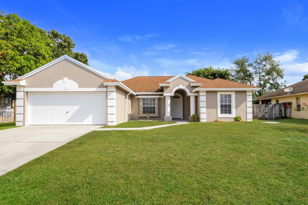 Photo of 459 SW Laconic Avenue, Port Saint Lucie, FL 34953 (MLS # B26028826)