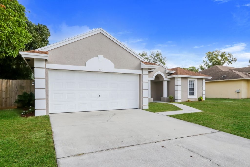 Photo of 459 SW Laconic Avenue, Port Saint Lucie, FL 34953 (MLS # B26028826)