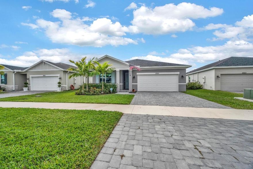 Wake up to tranquil lake views in this beautifully maintained 4-bedroom, 3-bath home w/2 car garage located in Azalia gated community at the heart of St. Lucie West. Enjoy a private gated yard & screened patio perfect for morning coffee, sunset unwinding, & entertaining. This energy-efficient home features a bright split floor plan, welcoming foyer entry, modern white shaker cabinetry, wood-look plank tile flooring, laundry room, & comfortable bedrooms designed for everyday living. Solar panels help keep utility costs low, while concrete block construction & a hip roof offer peace of mind. Located near Tradition, dining, shopping, entertainment, golf, & the Town Center, this home offers the perfect balance of comfort, convenience, & lifestyle. A wonderful place to settle in & feel at home.