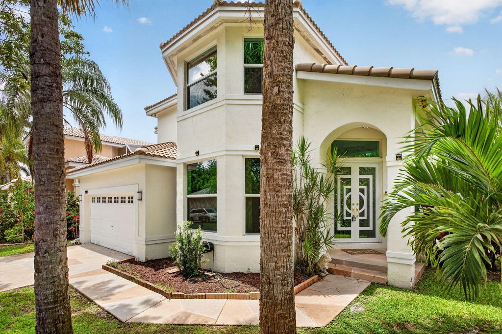 Photo of 7087 NW 78th Place, Parkland, FL 33067 (MLS # B26047760)