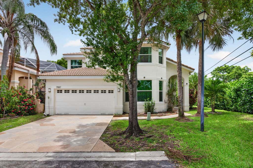 Photo of 7087 NW 78th Place, Parkland, FL 33067 (MLS # B26047760)