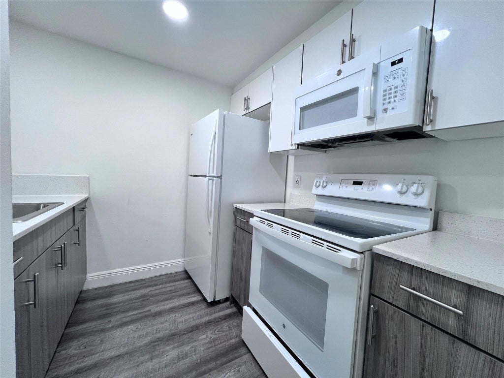 Photo of 1196 NW 40th Avenue #90-315, Lauderhill, FL 33313 (MLS # B26057095)