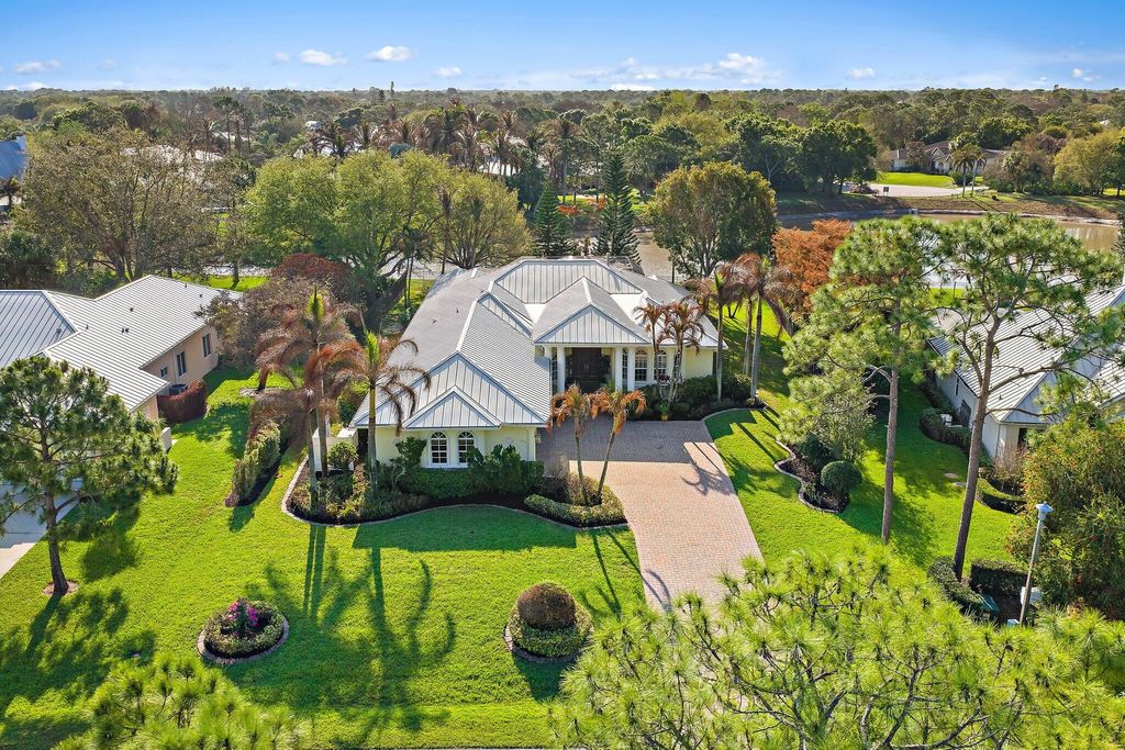 Photo of 3810 SW Canoe Creek Terrace, Palm City, FL 34990 (MLS # B26011554)