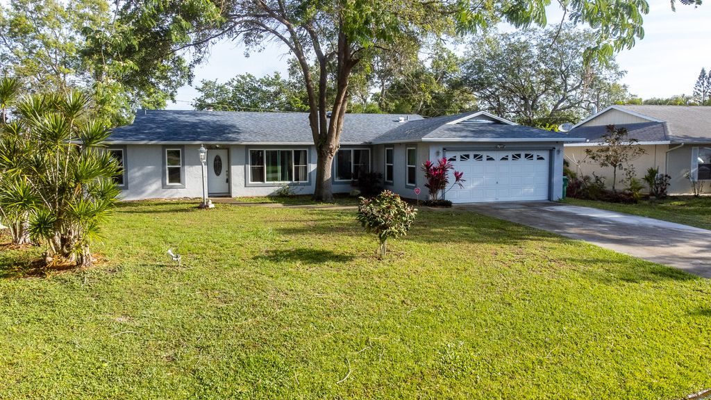 Photo of 713 SE Cavern Avenue, Port Saint Lucie, FL 34983 (MLS # R10784440)