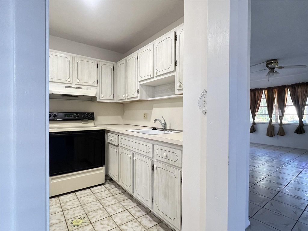 Photo of 1281 NW 43rd Ave #106, Lauderhill, FL 33313 (MLS # F10540683)