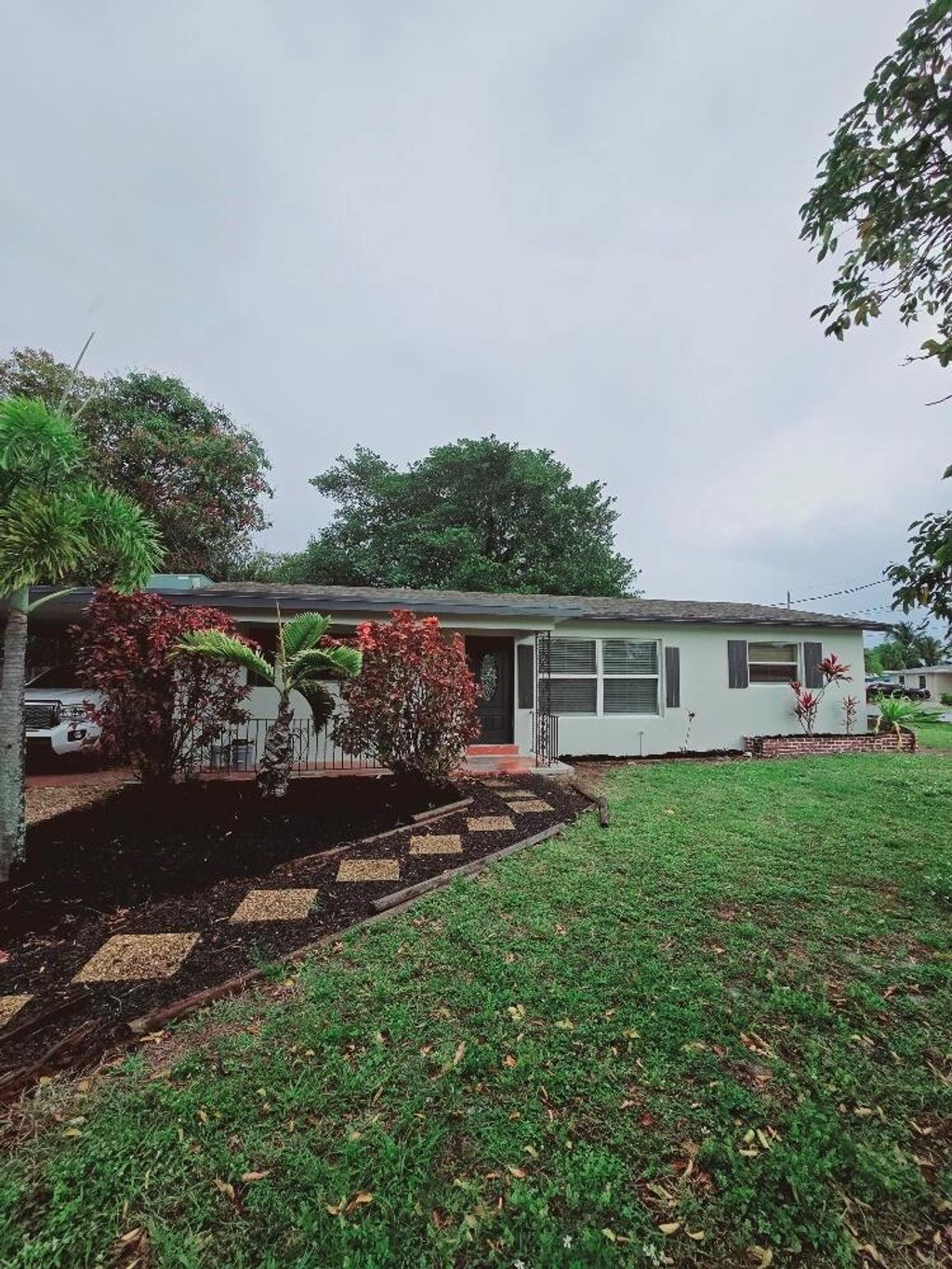 Photo of 1238 W Shore Drive, West Palm Beach, FL 33406 (MLS # R10971689)