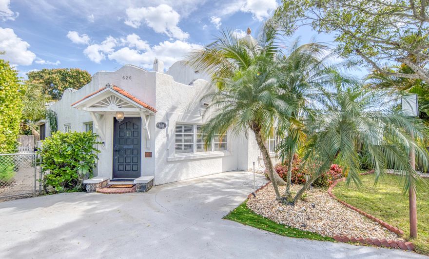 Stunning Spanish Mediterranean Luxury Home with waterfall Pool. Welcome to your dream oasis! A 5-minute drive to the beach, and less than 1-mile scenic walk or drive to beautiful views from the intercoastal bridge and downtown area with restaurants and shops. This exquisite 4-bedroom, 2-bath custom home is a true gem, offering a perfect blend of luxury and comfort. Nestled in the Mango Groves Neighborhood, this property boasts a gated driveway that ensures privacy and security.  As you step inside, you're greeted by a foyer with unique tiles and hardwood floors original to the home, leading to an expansive open-concept living area, filled with natural light.  The gourmet kitchen was recently renovated, featuring top-of-the-line appliances, custom cabinetry, and a spacious waterfall... ...and a spacious waterfall peninsula perfect for entertaining. This serene retreat is complete with two spa-like bathrooms, showcasing a soaking tub and walk-in shower. Four spacious bedrooms with large closets provide ample room for family and guests.  Step outside to your private paradise, where a beautifully landscaped backyard features a sparkling pool, perfect for relaxation and summer gatherings. This home is a rare find in this historic south Florida beach town, combining Mediterranean charm with modern luxury. Don't miss the chance to make this spectacular property your own!